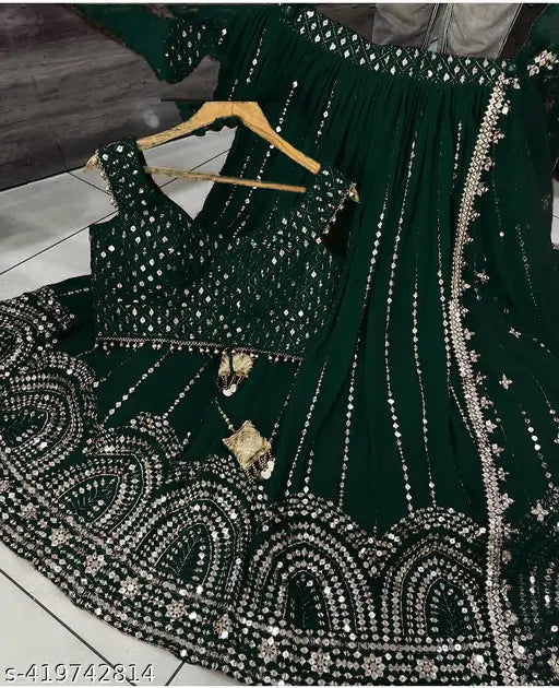 Georgette Lehenga Choli set, embellished and embroidered. Vibrant Indian attire for special occasions. Handcrafted elegance, luxury fashion