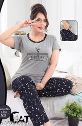 Grey cotton women's sleepwear set: Half sleeve t-shirt & pajama pants with printed design, offering comfort & style for a peaceful night in India