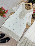 Heavy embroidered silk Chinnon top-bottom set with dupatta, three-quarter sleeves, and 900gm weight. Georgette and cotton blend fabric, ready to wear