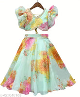 Designer georgette floral lehenga with choli for party-aged 3-8 years, made by Ved Fashion Hub. Luxurious silk, satin, or soft cotton blend fabric with intricate embroidery. Adjustable waistband and puffed sleeves on choli, complete with matching dupatta. Made in India