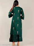 Dark green flared hem Viscose Rayon kurta set with Sharara bottom, three-quarter sleeves, solid pattern, gold printed below knee length, size S (36in bust, 26in waist), made in India