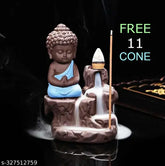Blue and black meditating Buddha statue with backflow incense holder, 10cm x 10cm x 10cm size, includes 11 scented cone incenses. Decorative showpiece for home or office