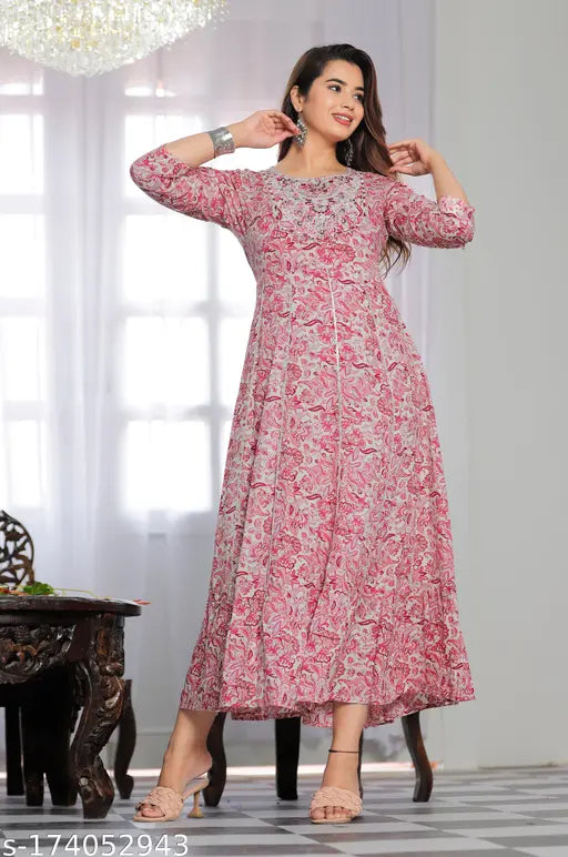 Stylish purple rayon embroidery gown with three-quarter sleeves, ideal for parties and festivals. Handcrafted in India using high-grade fabrics