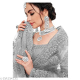 Gold-toned embroidered net lehenga choli with zari work, semi-stitched, Indian bridal wear on mannequin