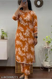Orange rayon coord set: printed net kurta with palazzos and matching top, three-quarter sleeves on display