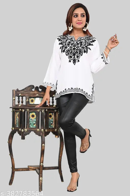 Hand embroidered white Rayon Lucknow Chikankari kurta top with three-quarter sleeves, suitable for various occasions