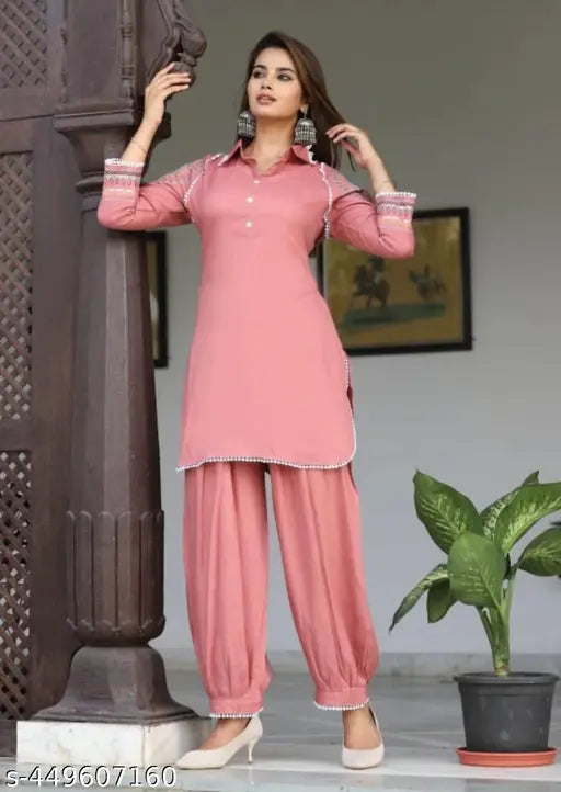 Rayon Jivika Sensational Women's Kurta Set with Patiala bottomwear, solid color design, three-quarter sleeves