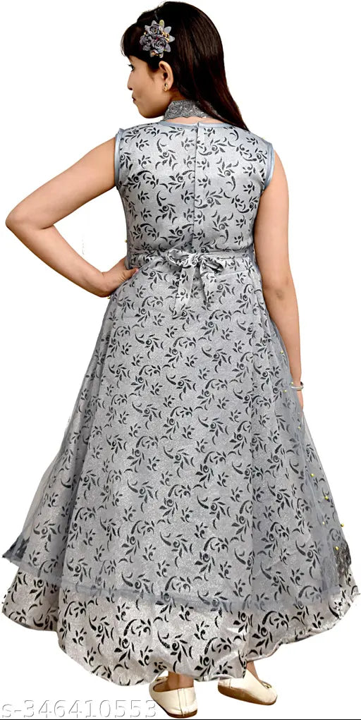 Pink floral printed net full-length ethnic gown for girls, sleeveless & layered with Zari Print, Cancan, Satin, and Astar. Perfect for parties and festive wear. Size: 10-11 Years