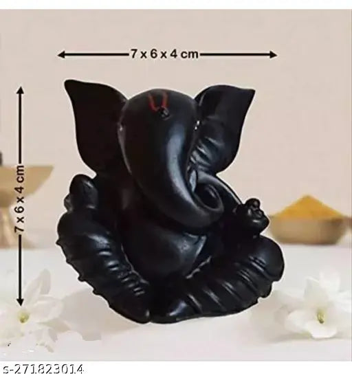 Black Ganesha idol, intricately carved poly resin showpiece for car dashboard or home decor. Perfect for festival gifting or temple display
