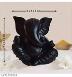 Black Ganesha idol, intricately carved poly resin showpiece for car dashboard or home decor. Perfect for festival gifting or temple display