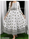 White rayon anarkali gold print kurti with three-quarter sleeves, printed combo, tassels - Indian women's fashion on mannequin