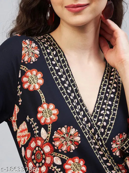 StyleStone women's rayon printed floral v-neck jumpsuit with three-quarter sleeves, available in sizes S-XXL. Black, vibrant floral pattern on a comfortable, breathable rayon fabric