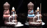 Blue-yellow resin Buddha smoke fountain incense burner idol with 20 cones, creates illusory smoky waterfall