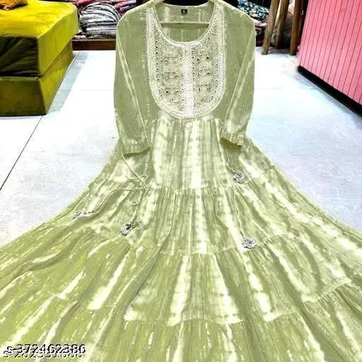 Dark green cotton embroidery gown with three-quarter sleeves, dyed/washed design. Indian craftsmanship in Rayon fabric." (124 characters)