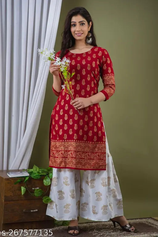 Red and White premium printed rayon kurti and palazzos set, featuring three-quarter sleeves and a highlight print design