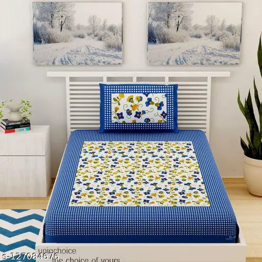 Blue cotton Jaipuri single bedsheet with matching pillow cover, featuring floral patterns on a regular thread count of 120 - ideal for summer adult use. Pure cotton bedding from UniqChoice, India