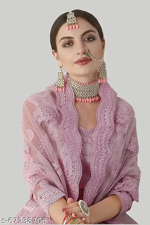 Embroidered flared chaniya choli with zari work, semi-stitched net lehenga and dupatta for women, Indian festive wear