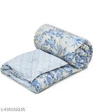 Multicolored, lightweight cotton single bed comforter (60x88 inches), ideal for mild winter and travel. Made in India