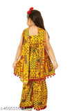 Yellow ethnic kurta & sharara set with dupatta, handcrafted from cotton rayon fabric. Perfect for casual or office wear in sizes ranging from 1-12 years old, made in India