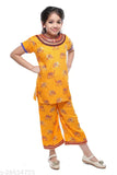 Yellow animal print kurti plazo by Bhatia Enterprise, Indian fashion statement on model