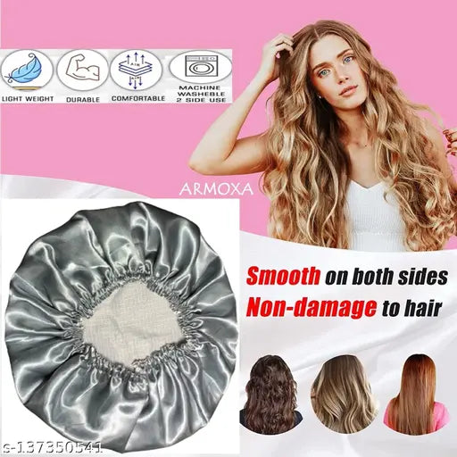 Grey satin silk hair bonnet cap with premium silk scrunchies for curly hair. Adjustable and stretchable for comfortable wear, ideal for sleeping or home cleaning. Protects fragile hair from dryness, breakage, sound & dust, and heat. Made with double-layered reversible design and includes 1 cap with 3 free soft scrunchies. Origin: India (13.6 x 11.4 x 5.6 INCH, approx. 60 g)