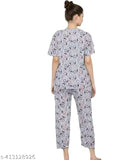 Modern silk-blend sleepwear 4-piece set, printed with a stylish design, perfect for comfortable loungewear or travel outfits. Made from stretchable fabric, featuring short sleeve t-shirts and pajama bottoms in sizes XS, S, M