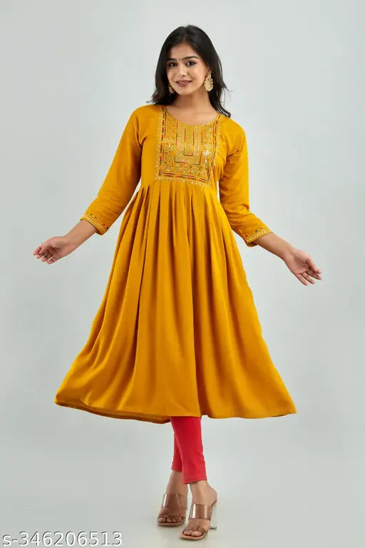 Yellow embroidered viscose rayon Anarkali Kurta with lace work, perfect for parties and weddings. Available in sizes S-XXXL. Made in India