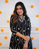 Printed rayon slub V-neck kurti and pant set with three-quarter sleeves, affordable fashion for casual or festive wear, India origin