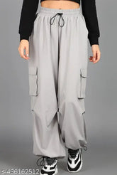 Grey poly blend high-waisted lose cargo trousers for women and girls, practical side pockets and versatile casual wear