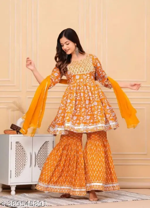 Orange rayon embroidered Anarkali Kurti set with Sharara and dupatta, trending Indian fashion