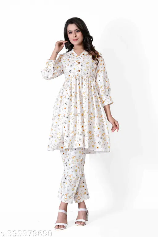 Multi-colored cotton net Rajasthani printed co-ord set for women, featuring a fit & flare style with 3/4th sleeves. Perfect for parties, outdoor events, or summer wear. Comes in sizes XL, L, M. Designed in India