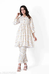 Multi-colored cotton net Rajasthani printed co-ord set for women, featuring a fit & flare style with 3/4th sleeves. Perfect for parties, outdoor events, or summer wear. Comes in sizes XL, L, M. Designed in India
