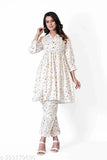 Multi-colored cotton net Rajasthani printed co-ord set for women, featuring a fit & flare style with 3/4th sleeves. Perfect for parties, outdoor events, or summer wear. Comes in sizes XL, L, M. Designed in India