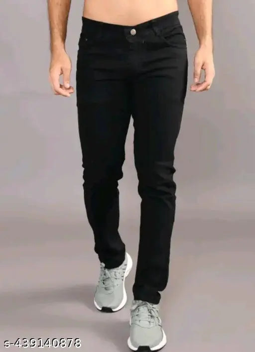Trendy men's black denim regular-fit jeans, solid pattern, versatile wardrobe essential for casual and edgy looks. Size: 24-34 (US). Made in India