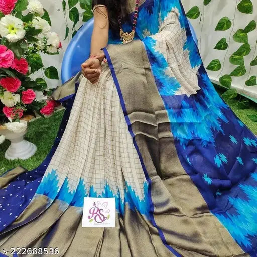 Moss green chiffon checked saree with matching printed net blouse, elegant and easy-care Indian fashion