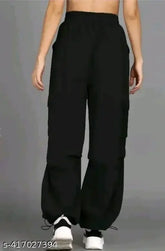 Black pants with a waistband, loose fit, long length, and cuffed hems