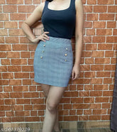 Cotton blend checked skirt, fitted and smoothing with high waistband, soft ribbed texture. Addictive comfort, skin-soothing design available in sizes 26, 28, 30, 32. Made in India