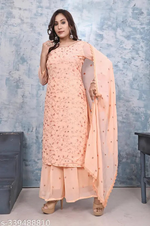 Georgette embroidered kurti set with sharara and dupatta, three-quarter sleeves, printed Indian traditional clothing on mannequin