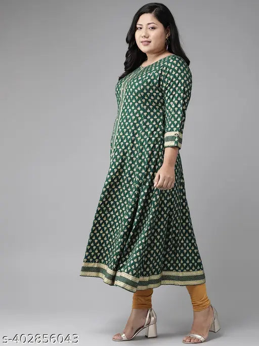 Green rayon ethnic motif round kurti, Yash Gallery women's style with 3/4 sleeves and gold floral print. Country of origin: India