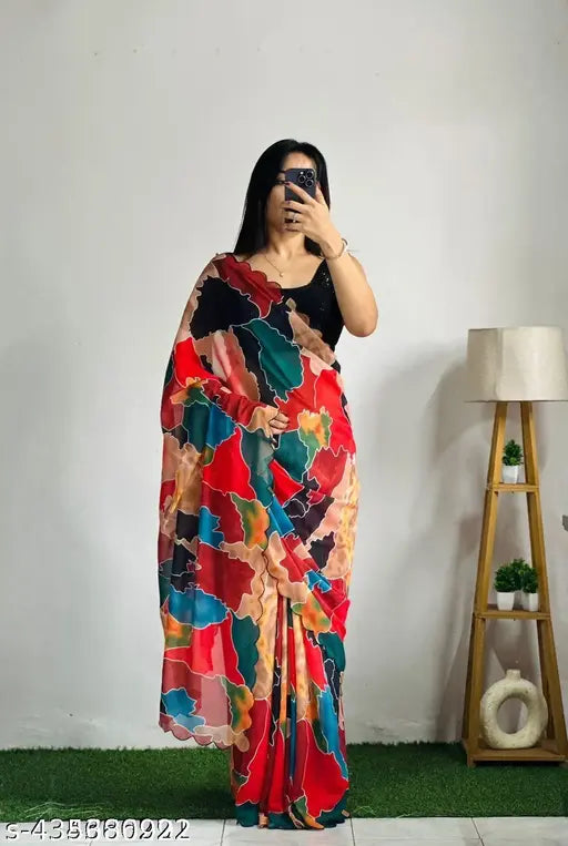 Multicolor georgette saree with cutwork border, embellished net blouse for Indian occasions