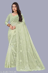Stunning super net saree with intricate embroidery and sequins, paired with a matching blouse. Indian-origin, free size