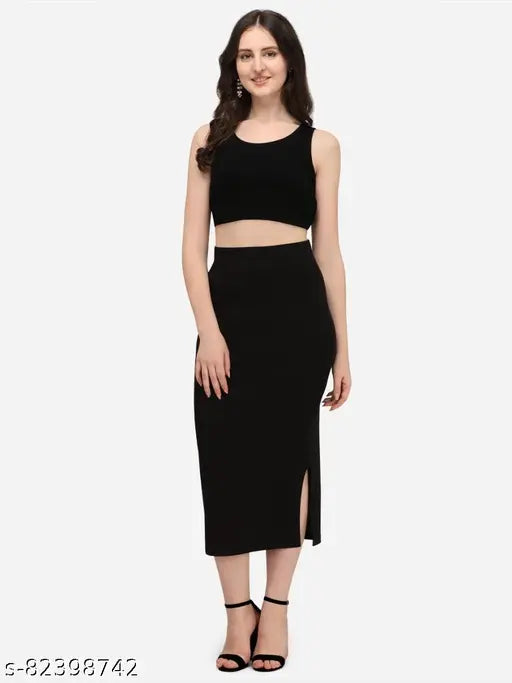 Viscose Rayon woman's fancy skirt with Lycra waist shaper, solid net pattern, compression for smooth abdomen, thighs, and back. Side slit for easy movement, available in various waist sizes (28-38). Origin: India