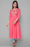 Women's Viscose Rayon A-line Kurta with embroidered pattern, three-quarter sleeves. Close-up of Indian ethnic wear on hanger