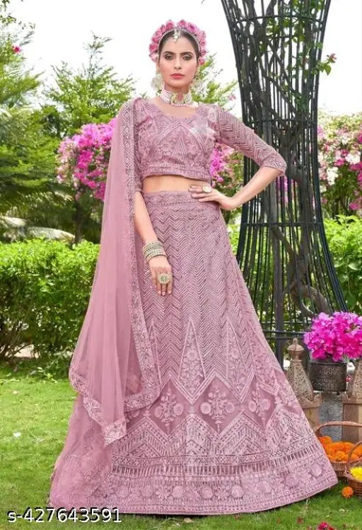 Embroidered net lehenga choli and dupatta, semi-stitched with 42" waist and 42" length, Indian bridal wear on mannequin