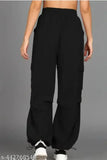 Oversized black polyester parachute pants, hippie-inspired cargo style with wide leg design, pack of 2 - women's streetwear