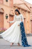 Premium designer cotton Cambric Anarkali gown with embroidered net, sequins, tassels, and matching dupatta, Indian wedding wear on display stand