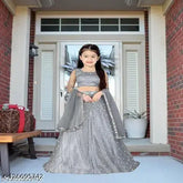 Women's angel-style semi-stitched net party wear lehenga choli, suitable for 3-15 years old girls. Embroidered and fitted waist with long sleeves. Made in India