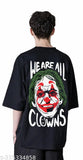 Black cotton blend joker oversized t-shirt with 3/4 sleeves, printed clown design for men on display