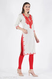 White wool embroidered Aari work kurta for women - Three-quarter sleeve, straight shape, calf length in multi-colored woolen fabric. Indian handcrafted design." (120 characters)