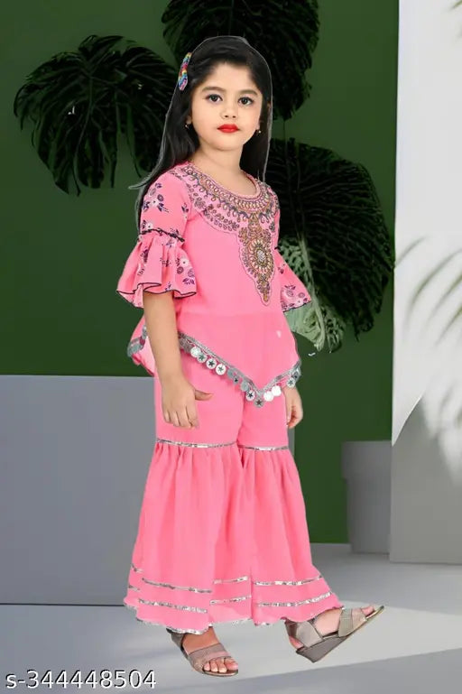 Modern cotton blend embellished kurta palazzos for girls, calf length A-line style with short sleeves. Available in sizes 3-4 years to 9-10 years, made in India